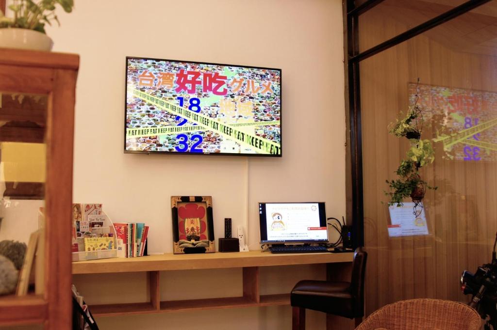 TV a/nebo společenská místnost v ubytování 和寂百年天井老房子包棟民宿wabisabi Japanese Entire Home