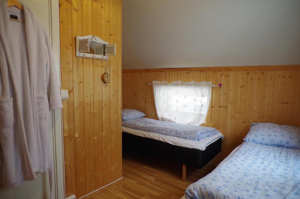 Postel nebo postele na pokoji v ubytování BIRK bed & birds