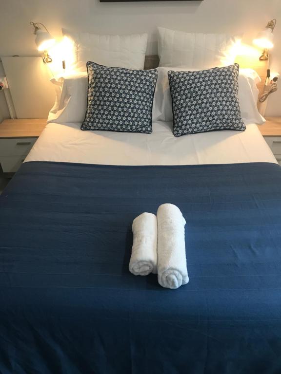 Postel nebo postele na pokoji v ubytování Apartamento Kasa Tomas Gros