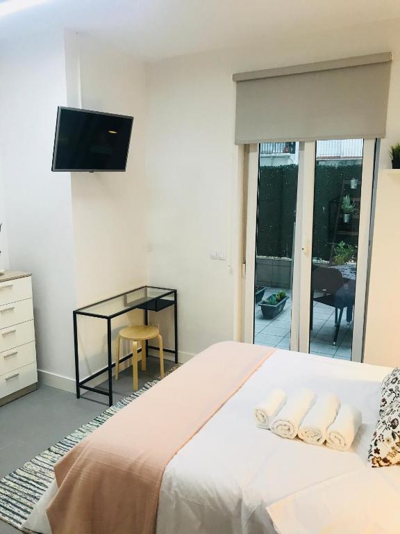 Postel nebo postele na pokoji v ubytování Apartamento Kasa Tomas Gros