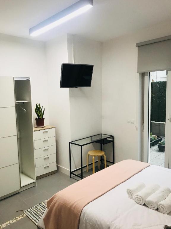 TV a/nebo společenská místnost v ubytování Apartamento Kasa Tomas Gros