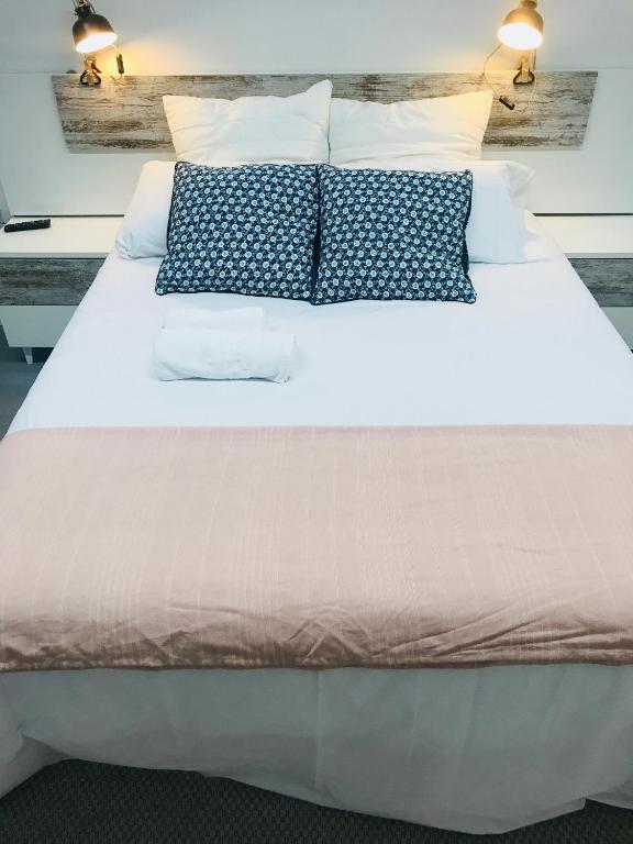 Postel nebo postele na pokoji v ubytování Apartamento Kasa Tomas Gros