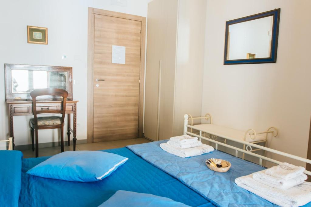 Postel nebo postele na pokoji v ubytování Valle dei Mulini - Lake Como