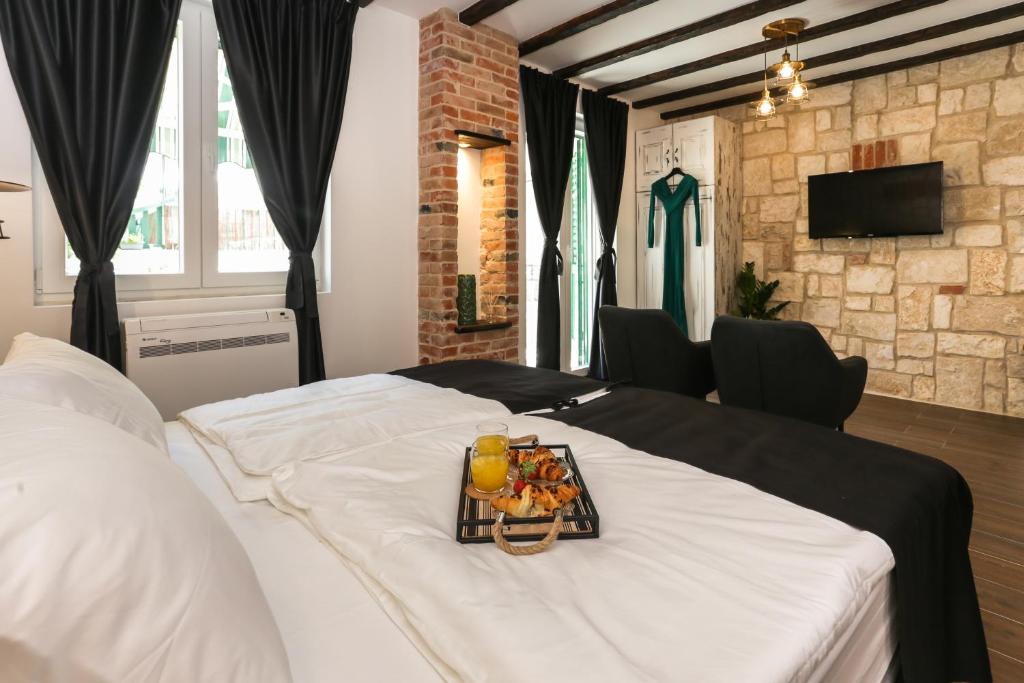 Posteľ alebo postele v izbe v ubytovaní Luxury Rooms Dino