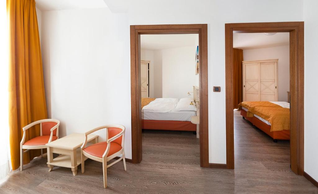 Łóżko lub łóżka w pokoju w obiekcie Regent's Hotel