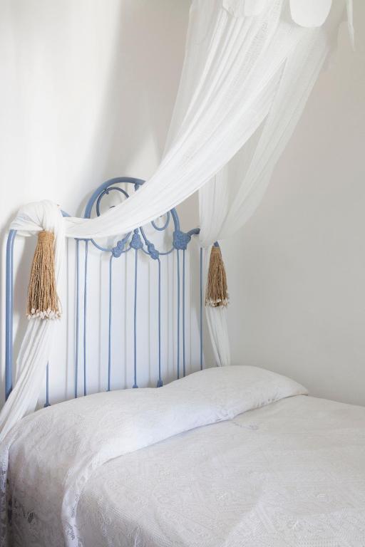 Postel nebo postele na pokoji v ubytování Quartara Boutique Hotel