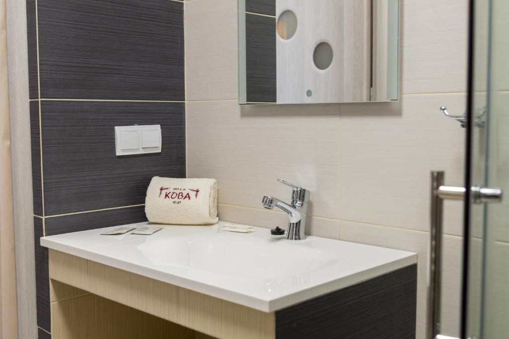 Kúpeľňa v ubytovaní Apartamenty Koba