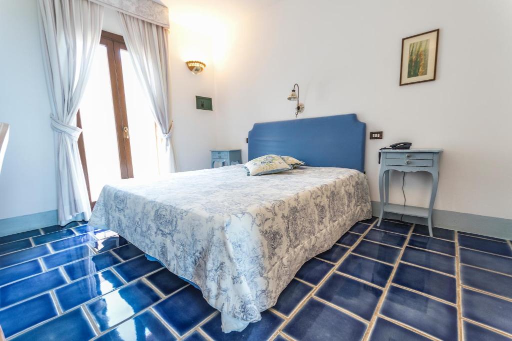 Postel nebo postele na pokoji v ubytování Masseria Ruri Pulcra