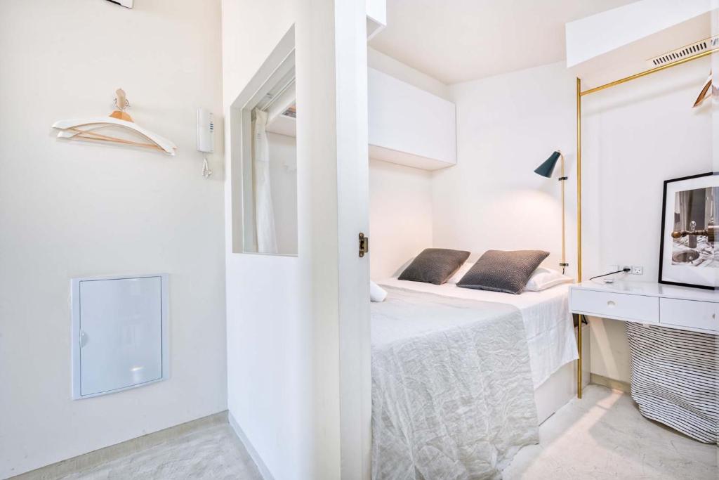 Posteľ alebo postele v izbe v ubytovaní Sagrado Corazon Penthouse in Malaga by Solaga Holiday Homes
