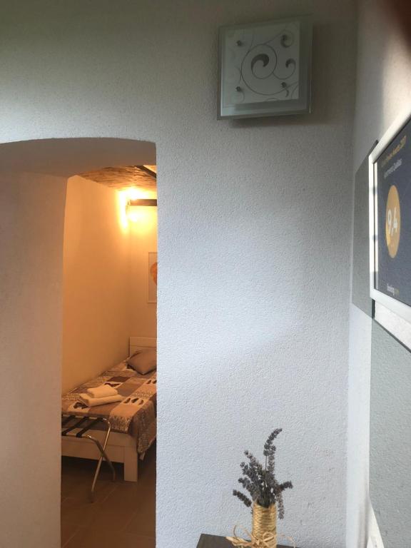 Una cama o camas en una habitación de Apartments Qualitas