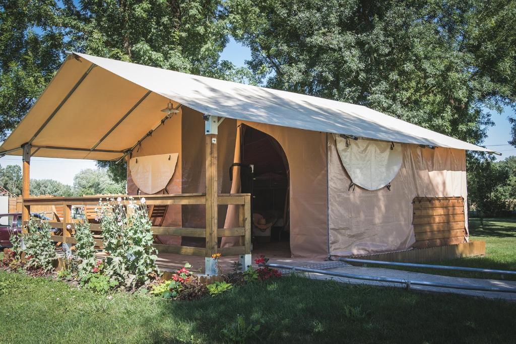 a large tent in the grass in a yard at L&#39;Escale des Châteaux de la Loire in Angé
