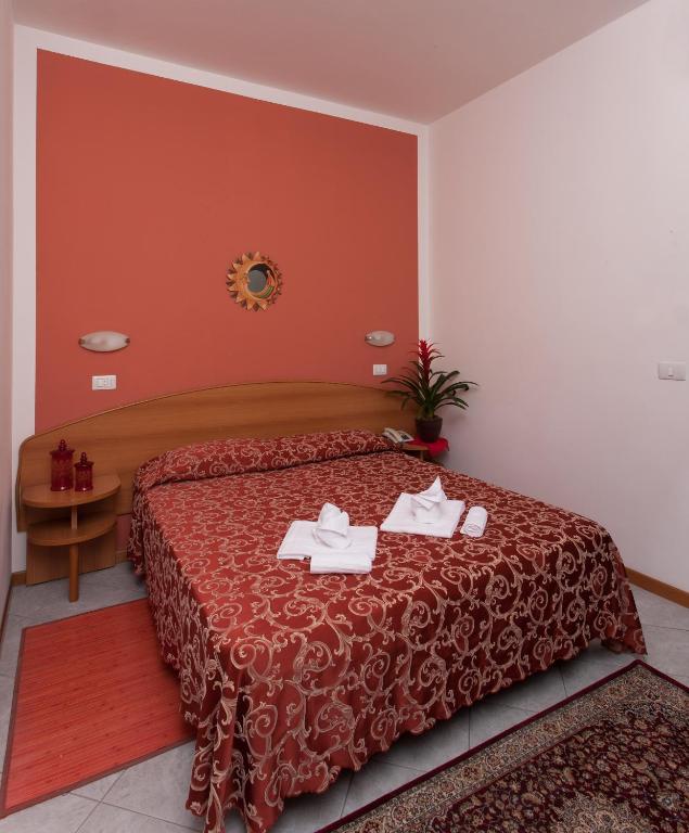 Postel nebo postele na pokoji v ubytování Hotel Bahama