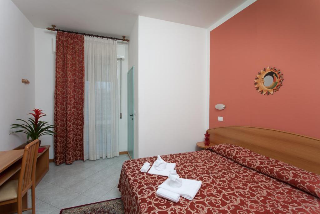 Postel nebo postele na pokoji v ubytování Hotel Bahama
