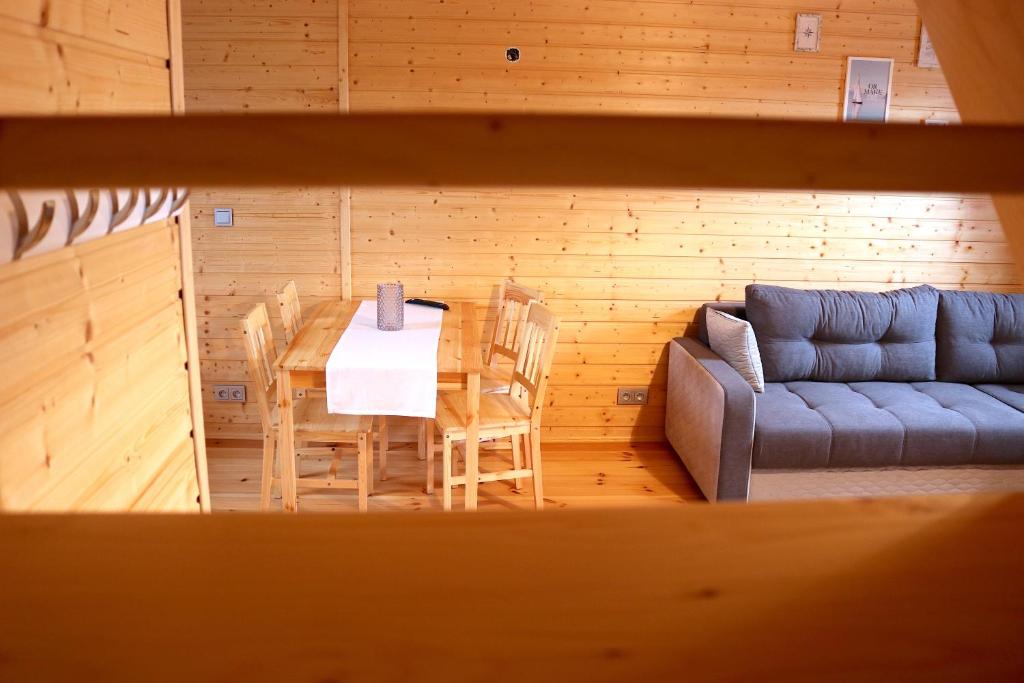 Posezení v ubytování Domki nad jeziorem