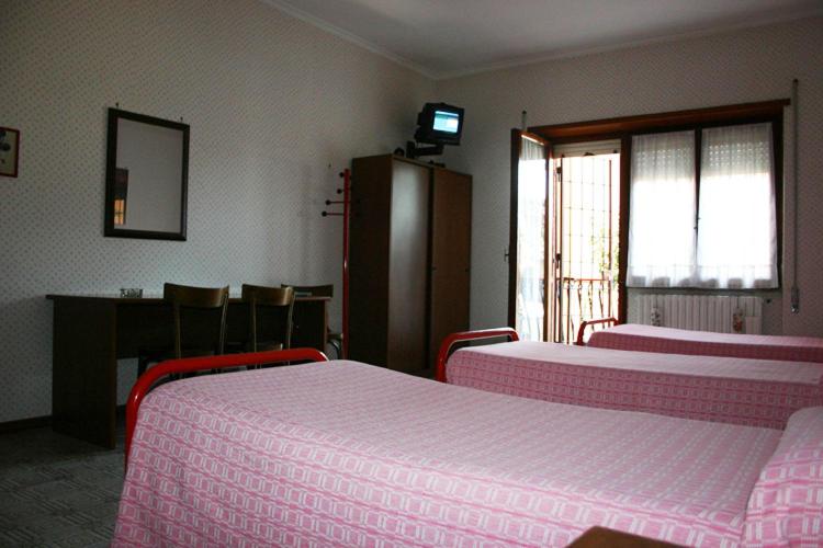 Postel nebo postele na pokoji v ubytování Albergo Anna