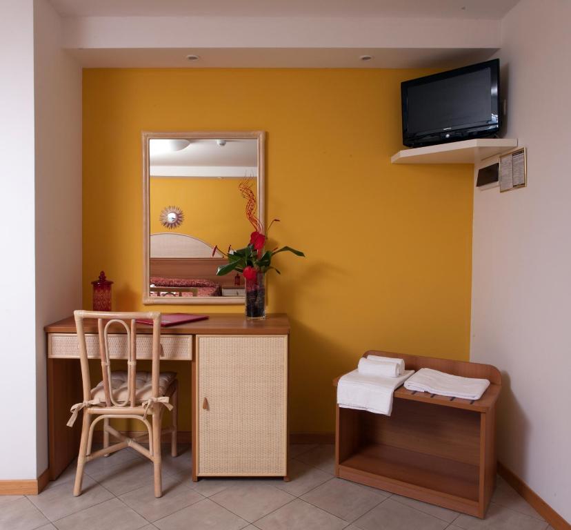 TV a/nebo společenská místnost v ubytování Hotel Bahama
