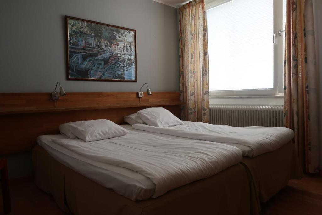 Postel nebo postele na pokoji v ubytování Hotel Aveny Bed & Breakfast