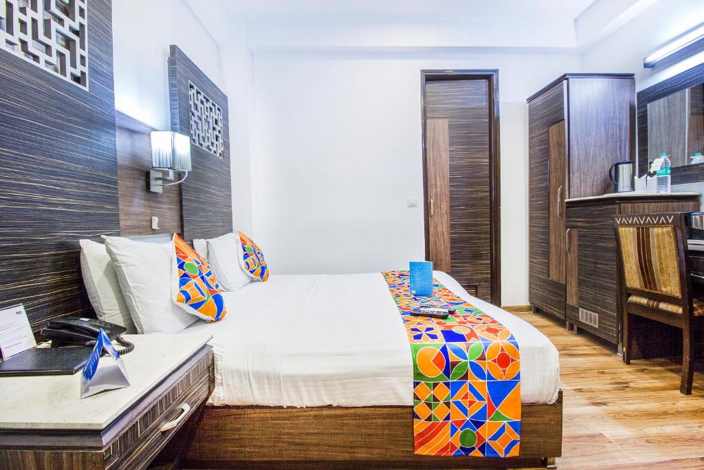 Postel nebo postele na pokoji v ubytování Hotel Sunstar Heights