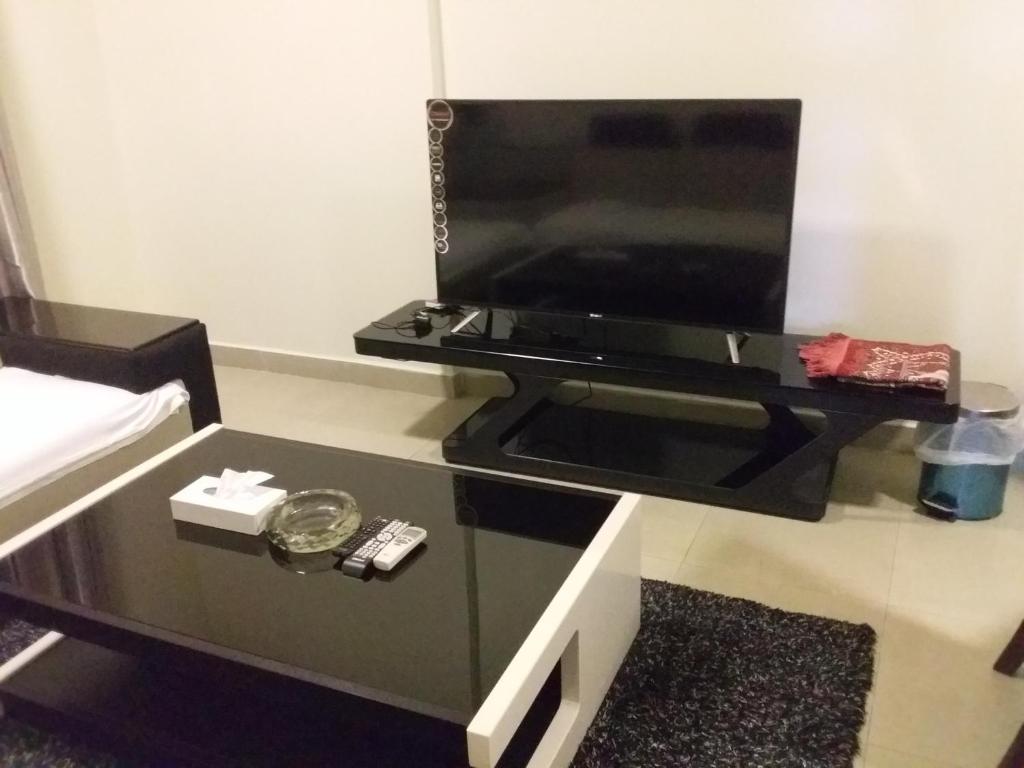 TV a/nebo společenská místnost v ubytování Reef Hotel Aparts (Tabasum Group)