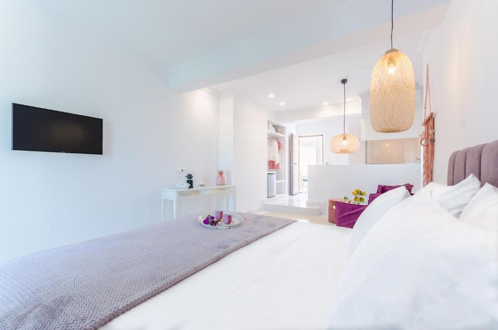 Postel nebo postele na pokoji v ubytování Malia Mare Hotel