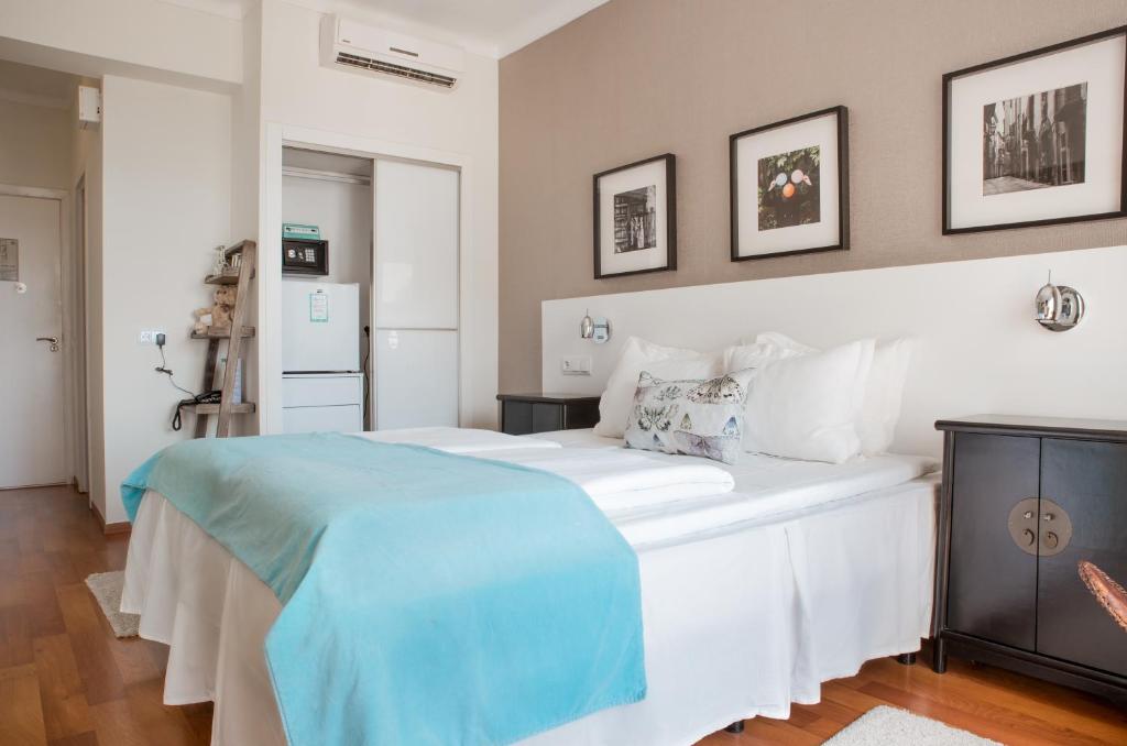 Postel nebo postele na pokoji v ubytování Hotel Feliz
