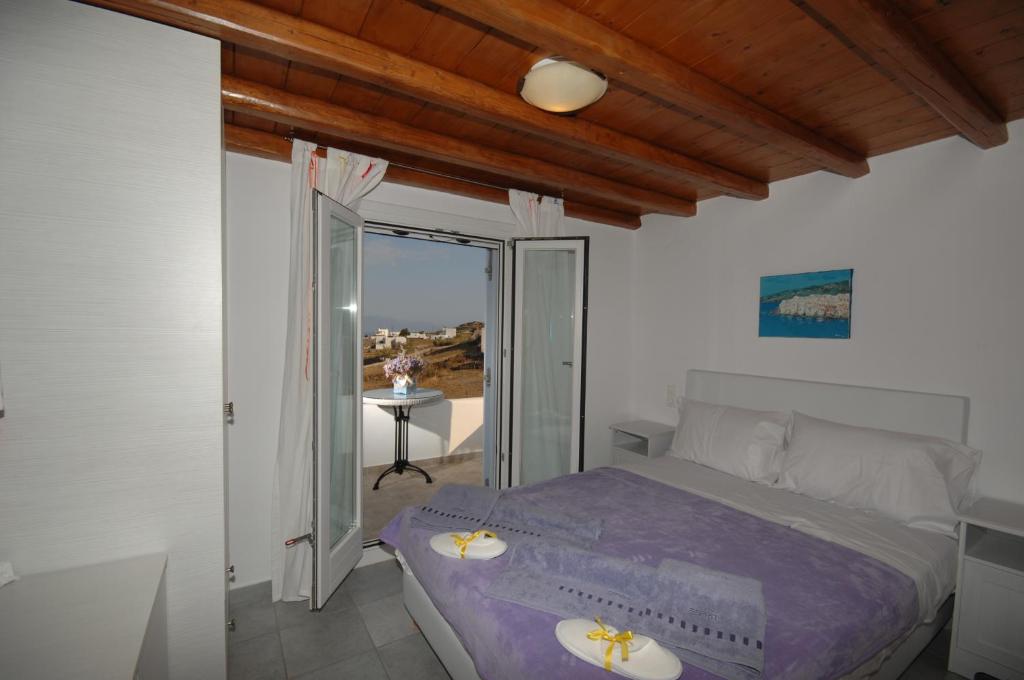 Cama ou camas em um quarto em Lino Apartments