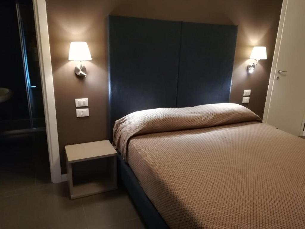Postel nebo postele na pokoji v ubytování Garda Guest House