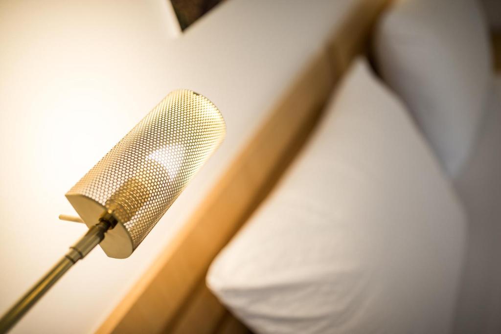 Postel nebo postele na pokoji v ubytování Mondschein Rooms