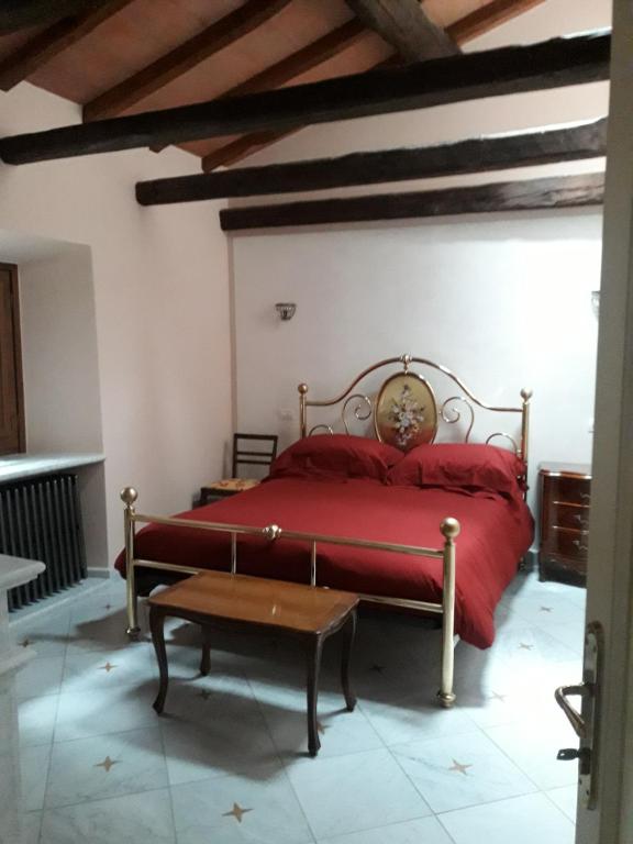 Postel nebo postele na pokoji v ubytování B&B Villa Tonelli