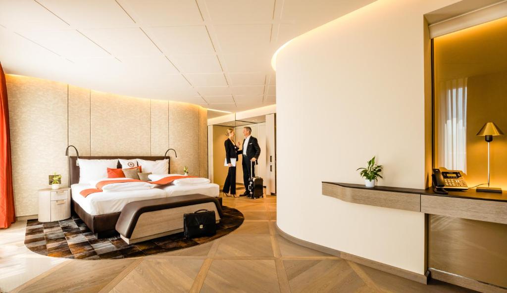 Postel nebo postele na pokoji v ubytování Hotel Neues Tor