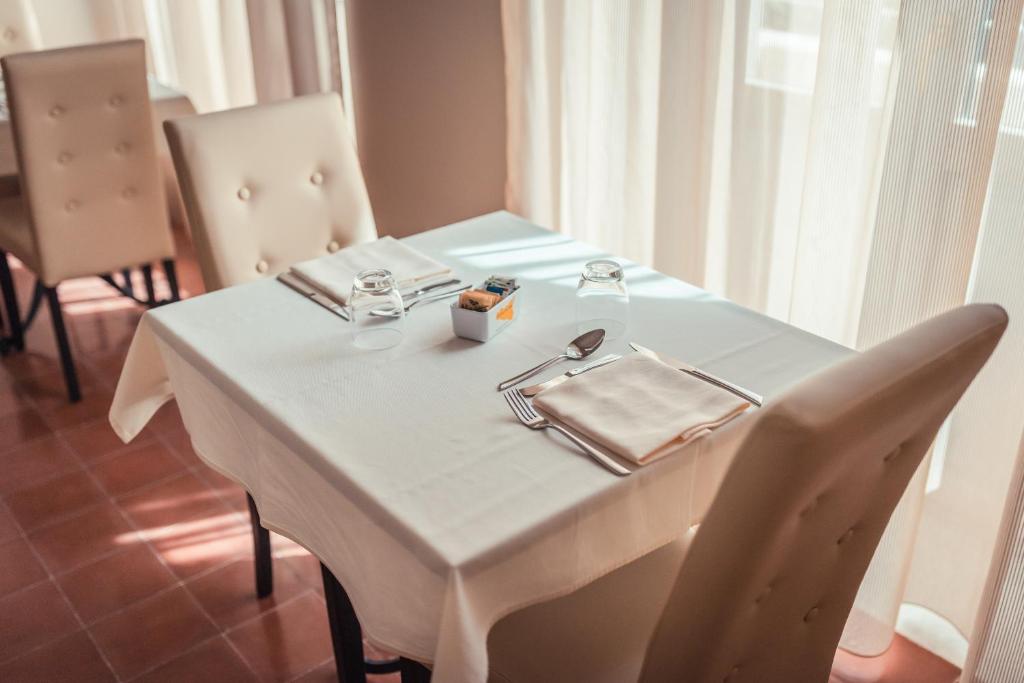A restaurant or other place to eat at Hotel Casa Adele
