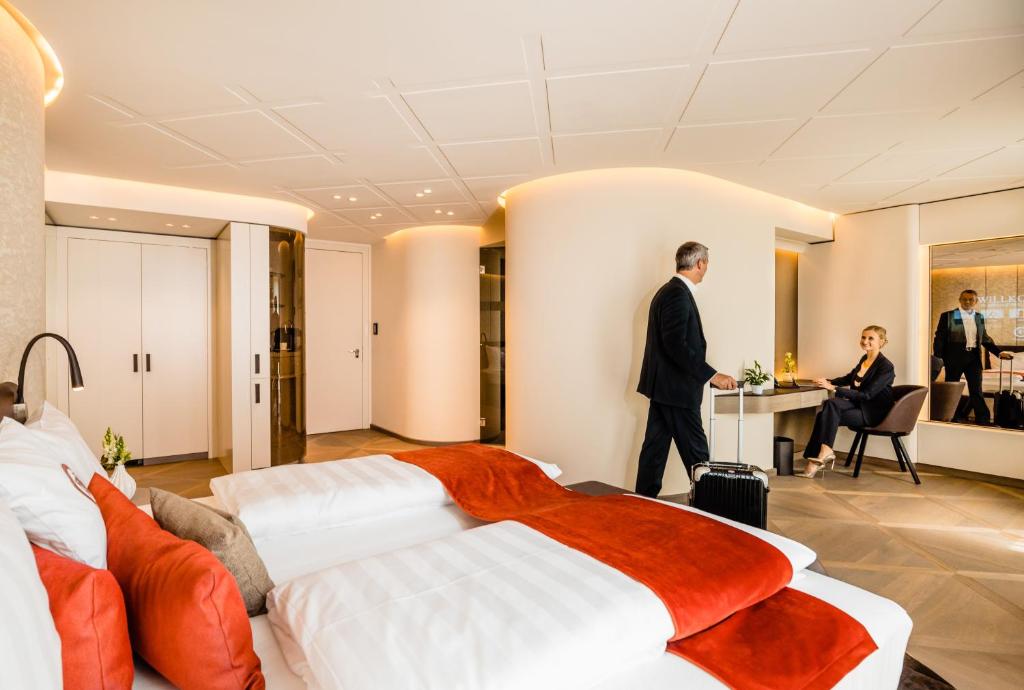 Postel nebo postele na pokoji v ubytování Hotel Neues Tor
