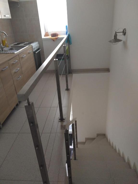 A kitchen or kitchenette at Ubytovanie Janka