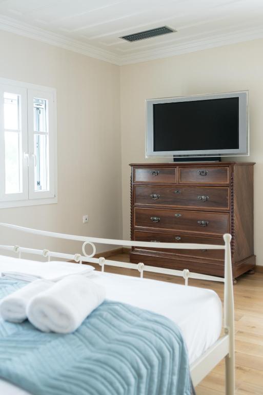 Postel nebo postele na pokoji v ubytování Siora Tanto Rustic Villa