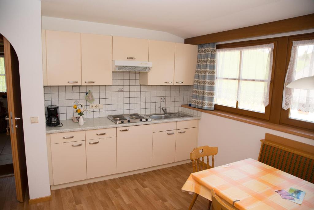 Kuchyň nebo kuchyňský kout v ubytování Stegerhof