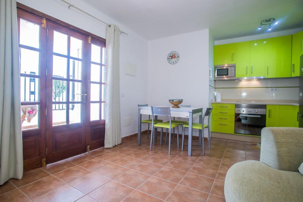 Kuchyň nebo kuchyňský kout v ubytování Apartamento Martina