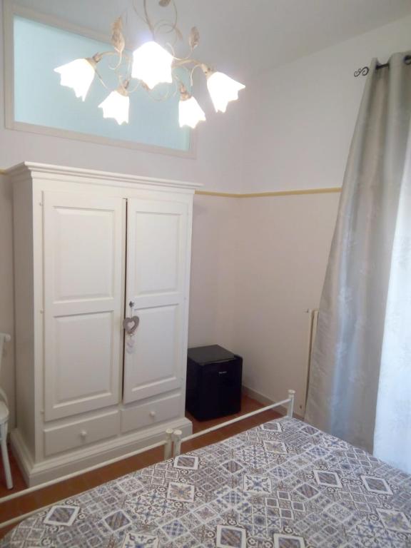 Postel nebo postele na pokoji v ubytování B&B Lilium Otranto