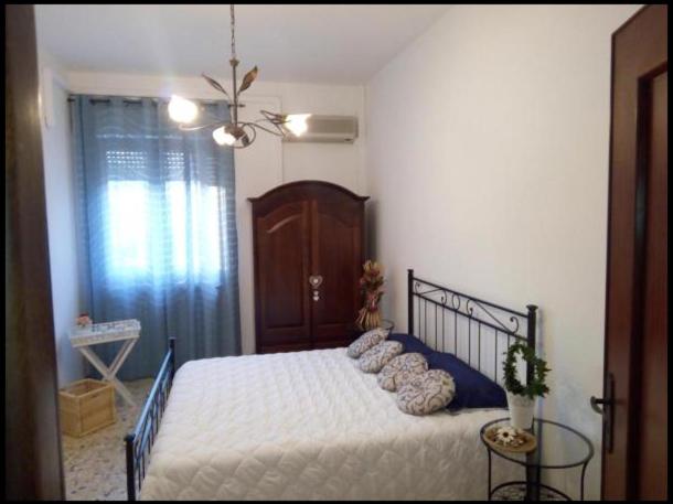 Postel nebo postele na pokoji v ubytování B&B Lilium Otranto