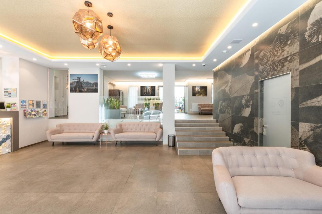Posedenie v ubytovaní Corvin Plaza Apartments & Suites