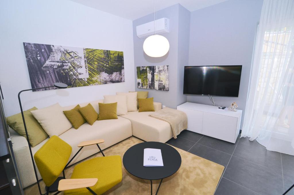 TV a/nebo společenská místnost v ubytování Plage Lovran Residence