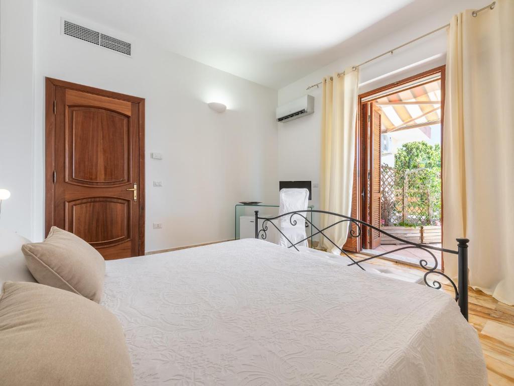 Postel nebo postele na pokoji v ubytování Villa Iole