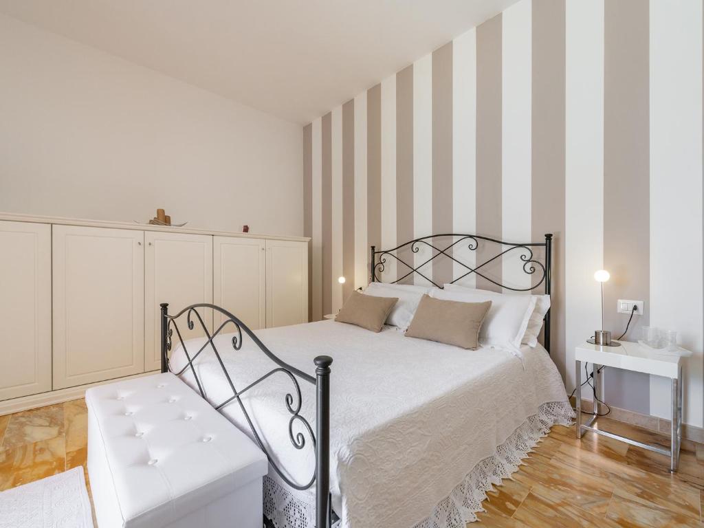 Postel nebo postele na pokoji v ubytování Villa Iole