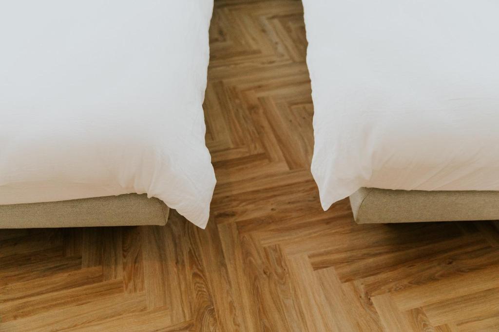 Postel nebo postele na pokoji v ubytování Hotel Jerom