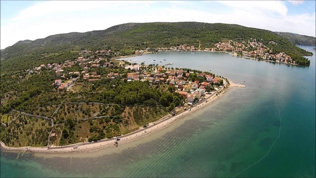 an aerial view of a small island in the water at Neva in Bilice