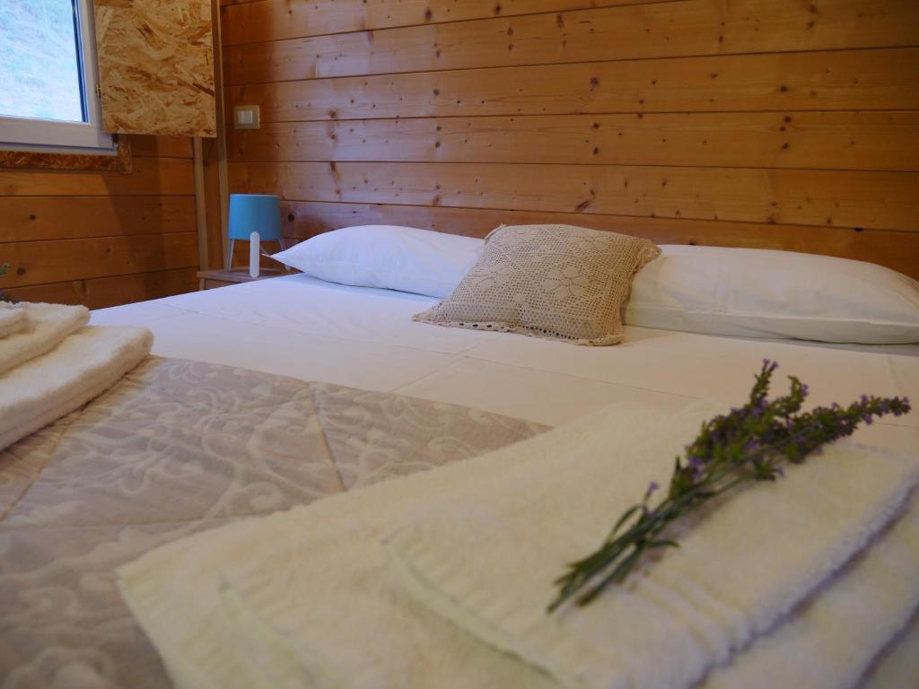 Postel nebo postele na pokoji v ubytování Camping Fiori di Noto