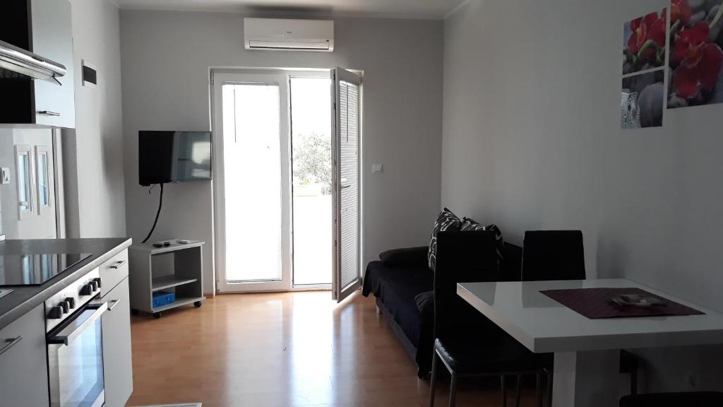 Kuchyň nebo kuchyňský kout v ubytování Apartments 255