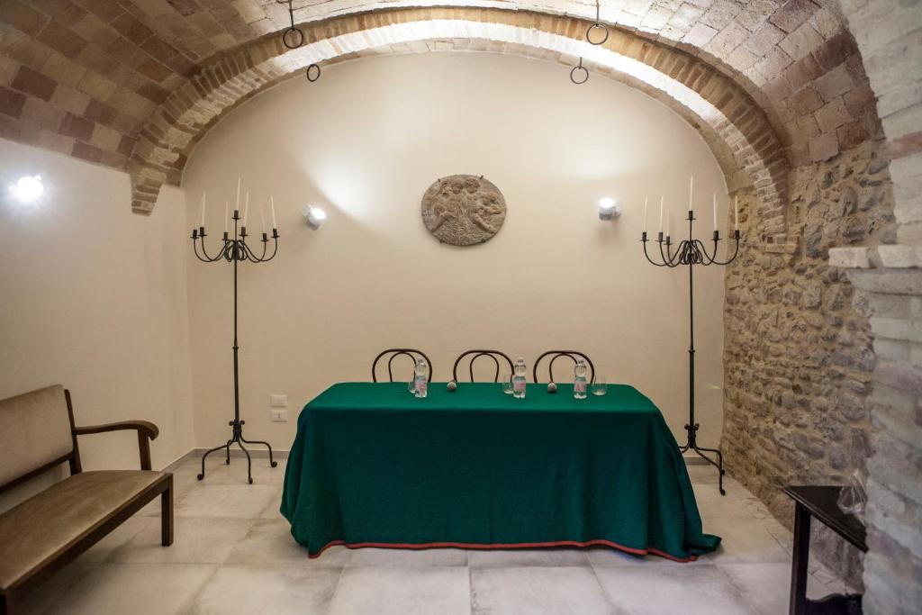Posteľ alebo postele v izbe v ubytovaní Dimora Il Palazzetto
