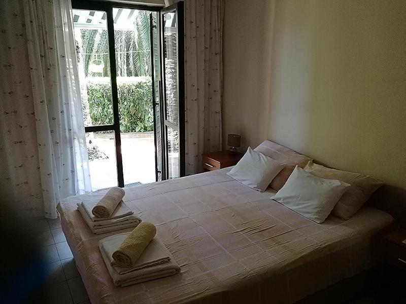 Voodi või voodid majutusasutuse Apartmani i sobe Goca toas