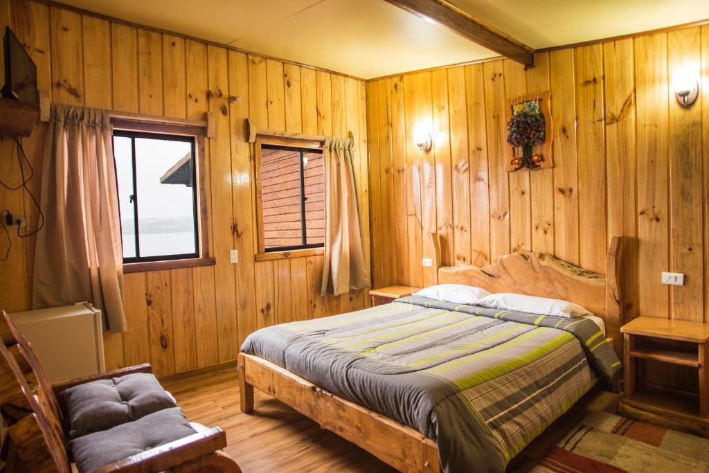 Postel nebo postele na pokoji v ubytování Apart hotel Puchaley Lafquen