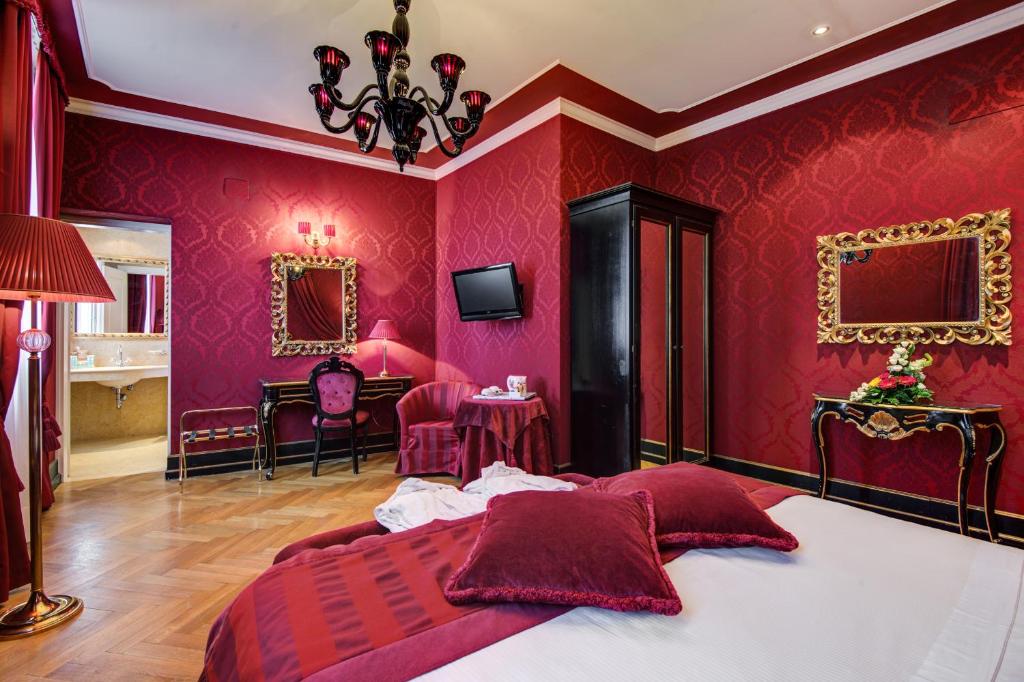 Postel nebo postele na pokoji v ubytování Hotel Al Duca Di Venezia